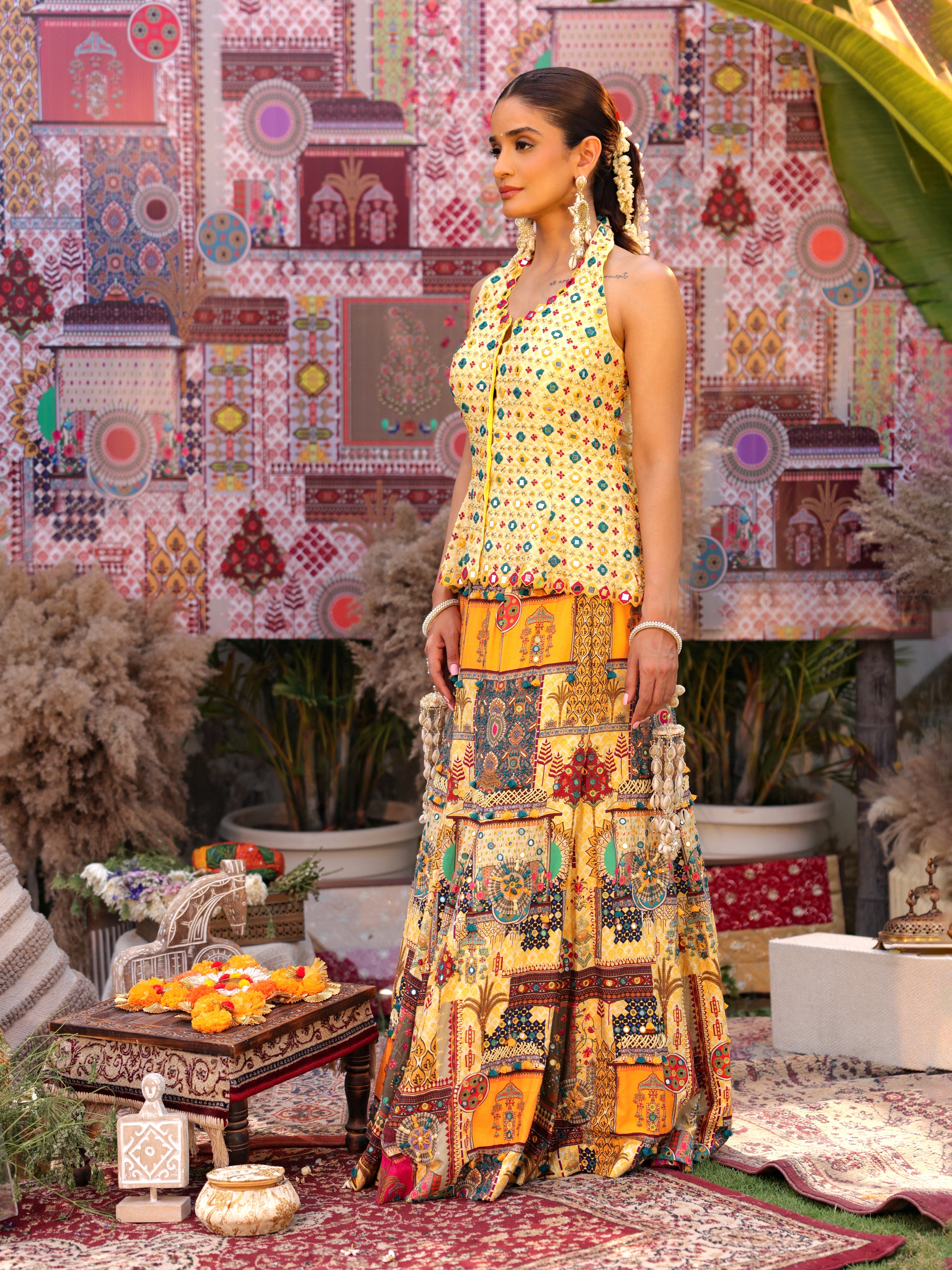 butter yellow halter neck peplum bodice with printed, embroidered multi-coloured lehenga set