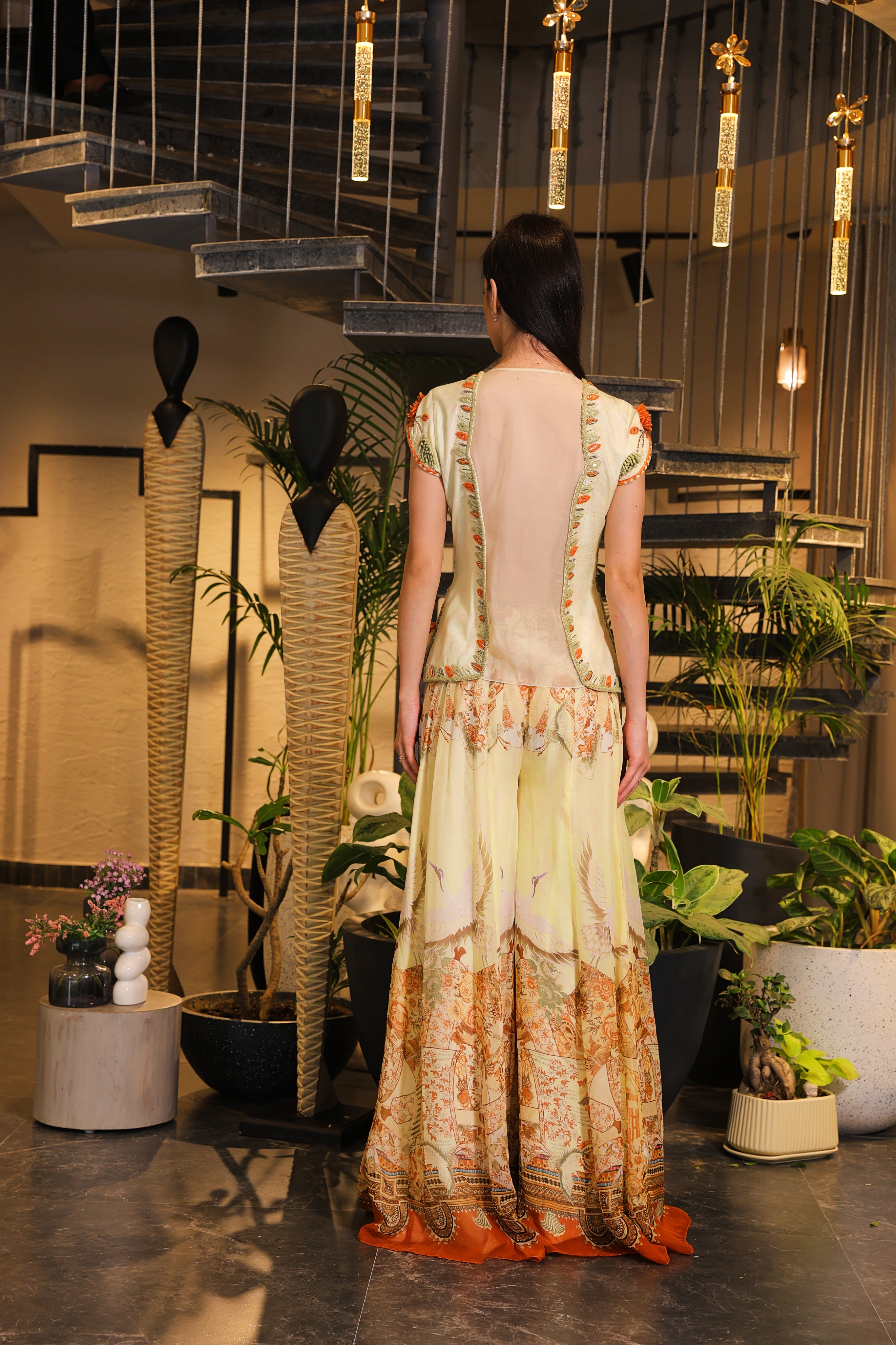 Swayam Alabaster cream printed sharara with embroidered peplum cut jacket bodice