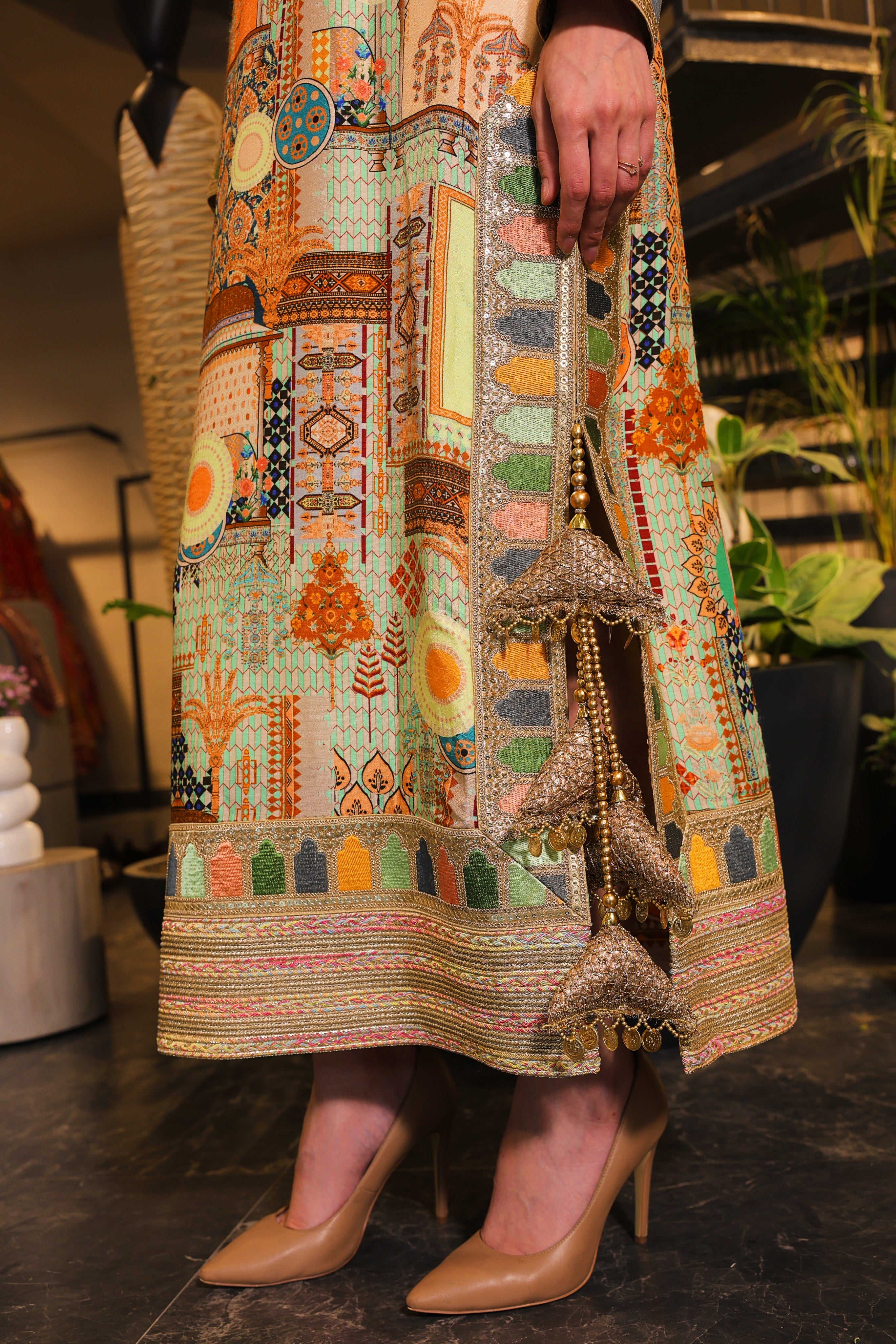 Long slit kurti , embellished with hand embroidery and tassels