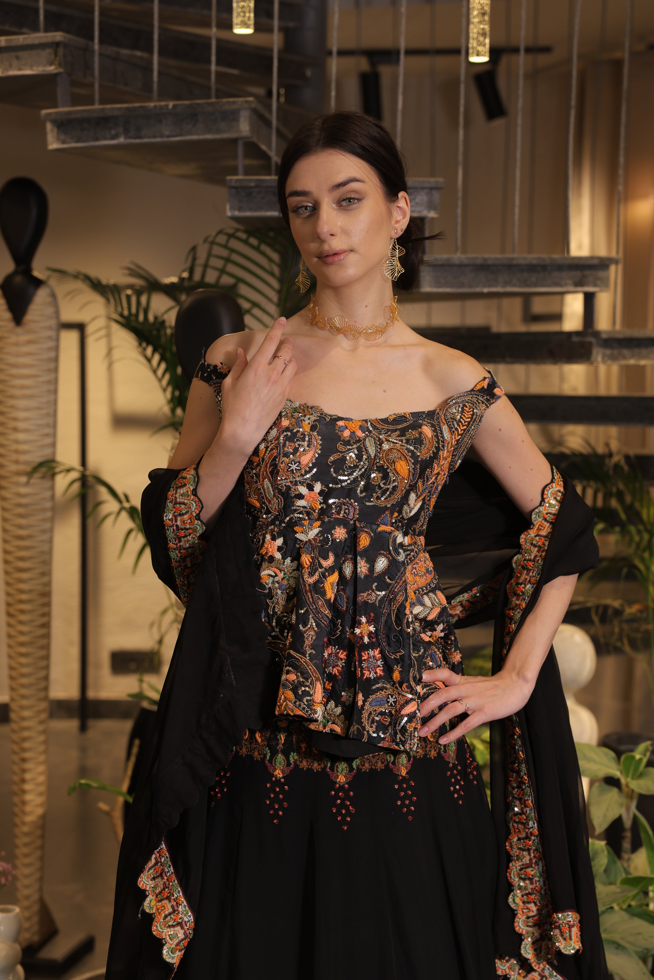 Black multi-coloured print embroidered lehenga set with off-shoulder peplum bodice