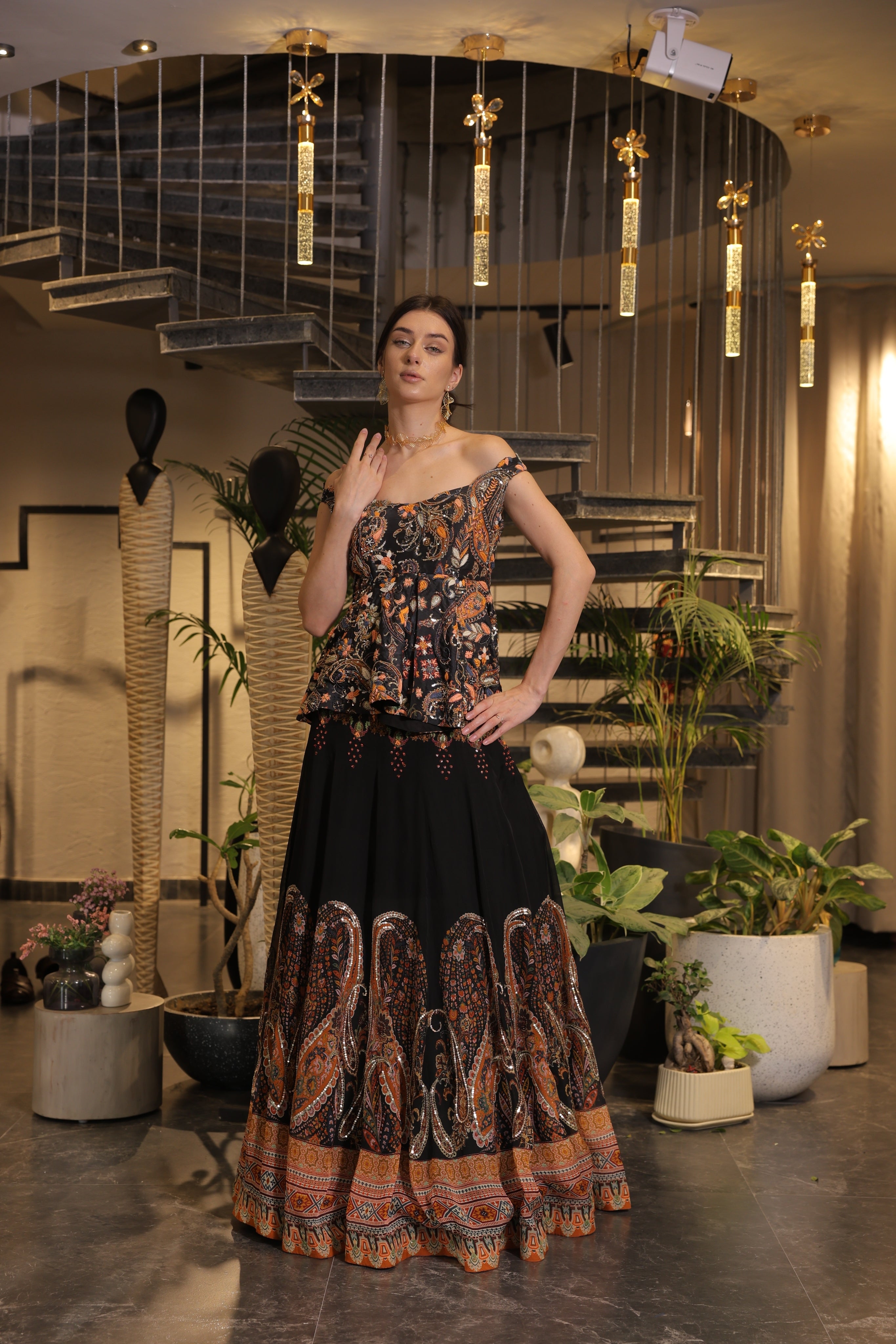 Black multi-coloured print embroidered lehenga set with off-shoulder peplum bodice