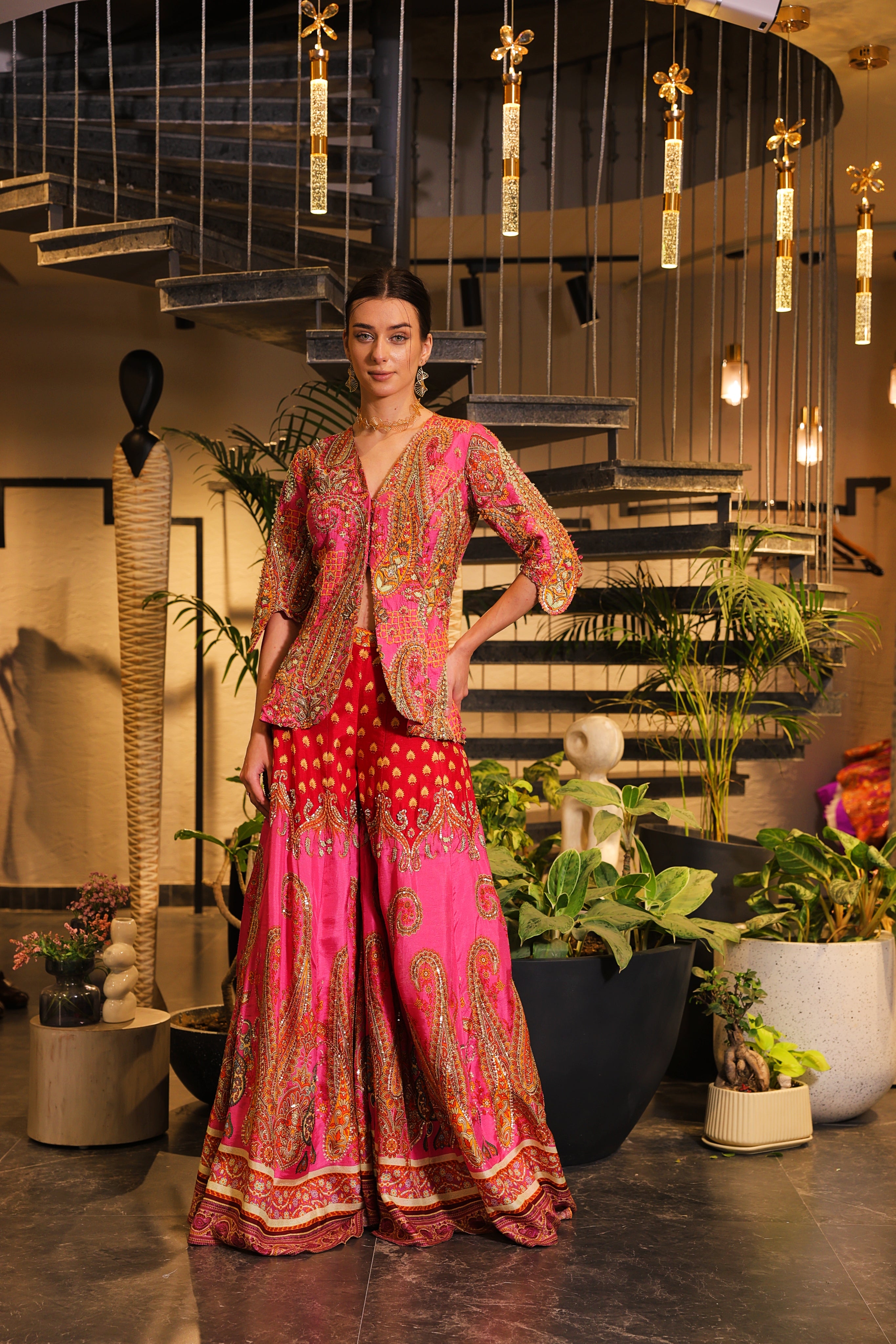Pink print embroidered Jhankaar sharara pants with peplum cut bodice