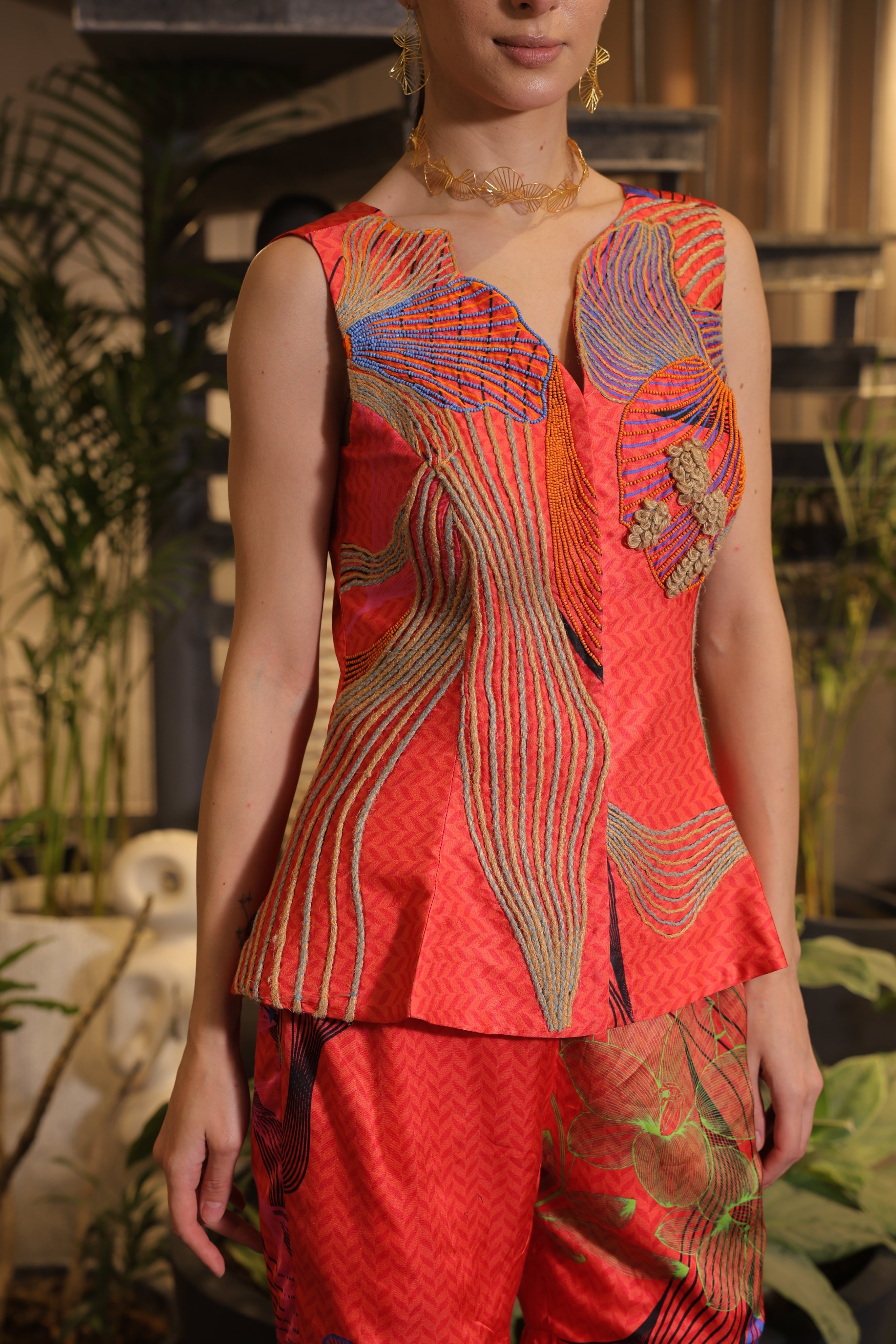 Crimson printed ethnosplash peplum cut bodice with garara pants.