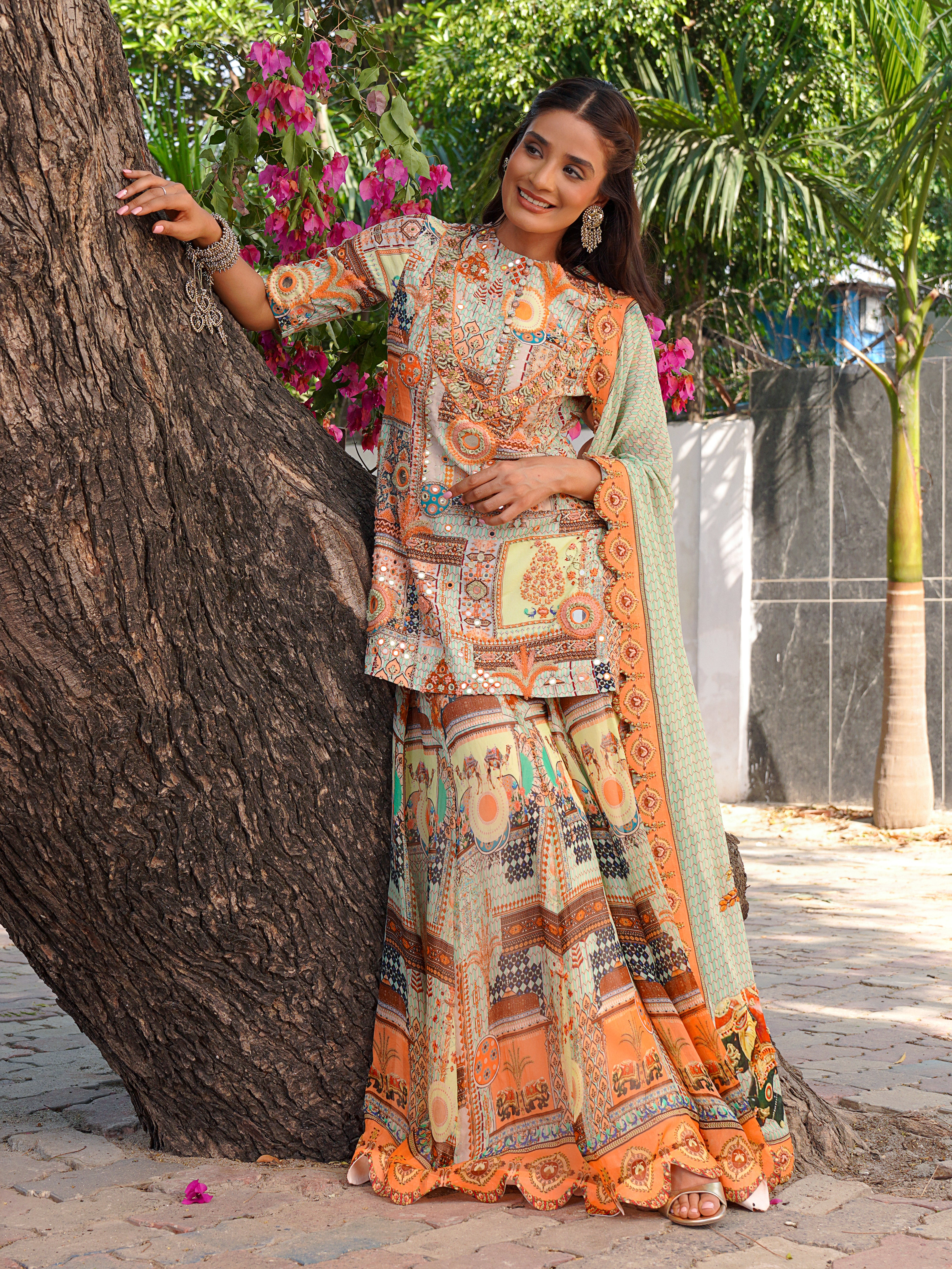 mint multi coloured short Kurti with flared sharara and dupatta
