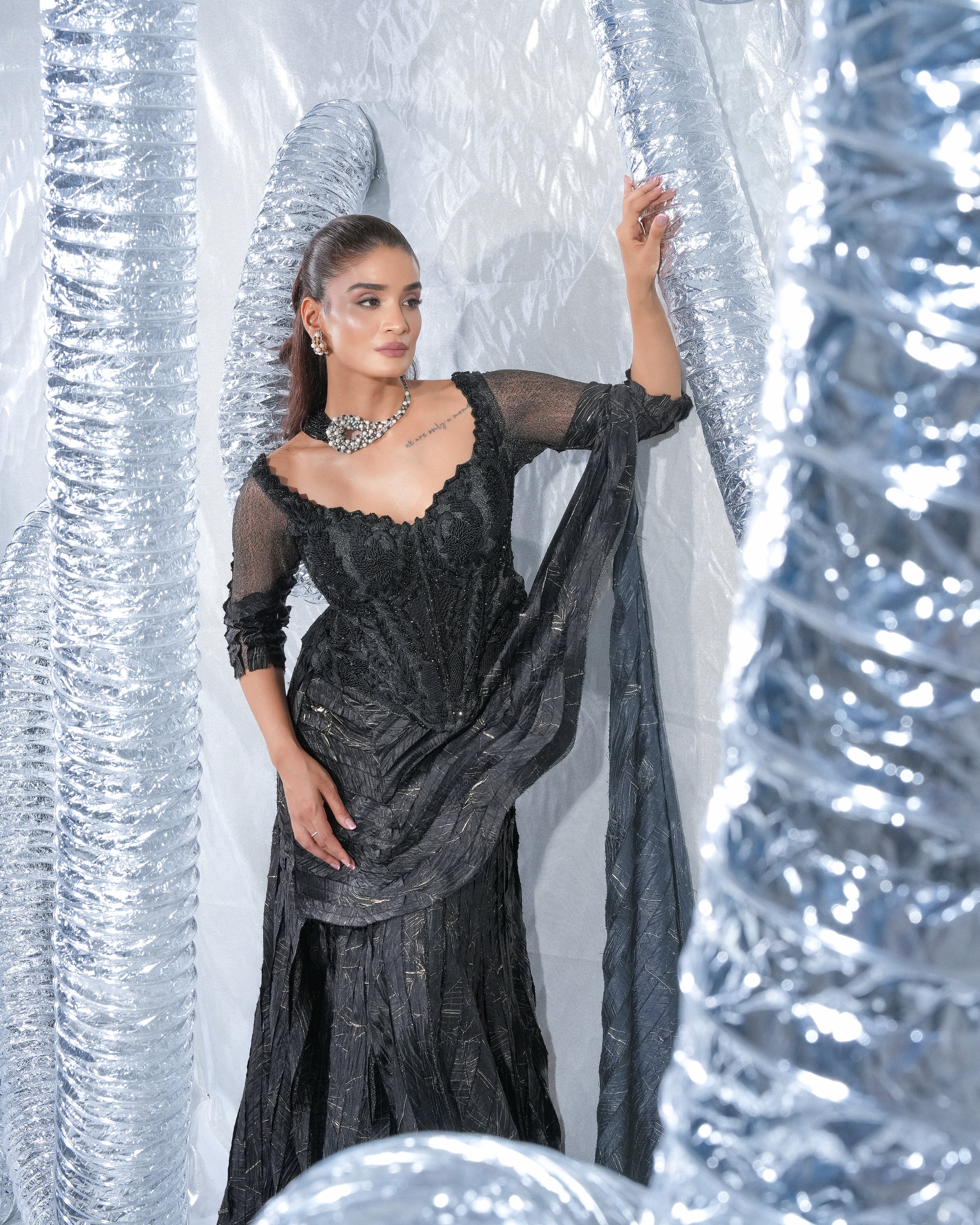 Black corset saree, embellished with crushed and failed ethno strip with signature zardozdi embroidery neo