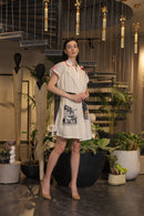 Off white crochet overlay dress with a belt and graphic printed pockets