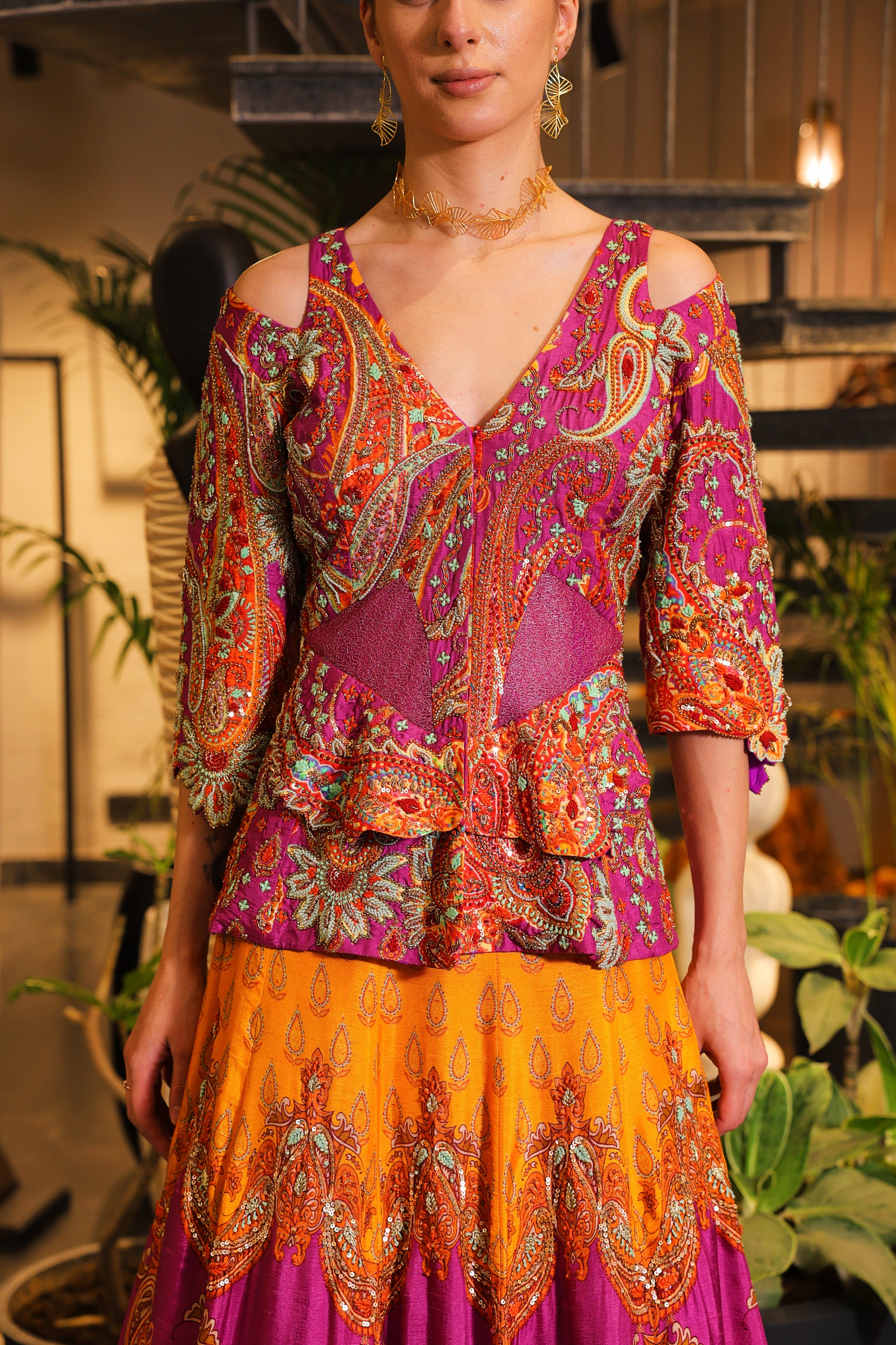 mystic purple and mustard print embroidered Lehenga with peplum bodice