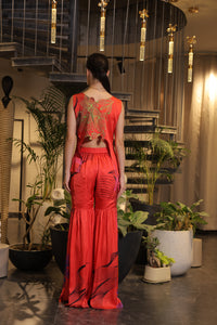 Crimson printed ethnosplash peplum cut bodice with garara pants.
