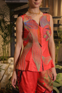 Crimson printed ethnosplash peplum cut bodice with garara pants.