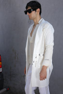 White overlay with AJ logo printed belt paired with shirt and pants