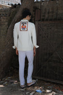 Off white shirt with large printed pockets paired with pants