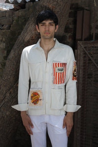 Off white shirt with large printed pockets paired with pants