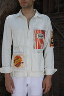 Off white shirt with large printed pockets paired with pants