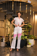 White hand painted cropped lapelled jacket with flared pants