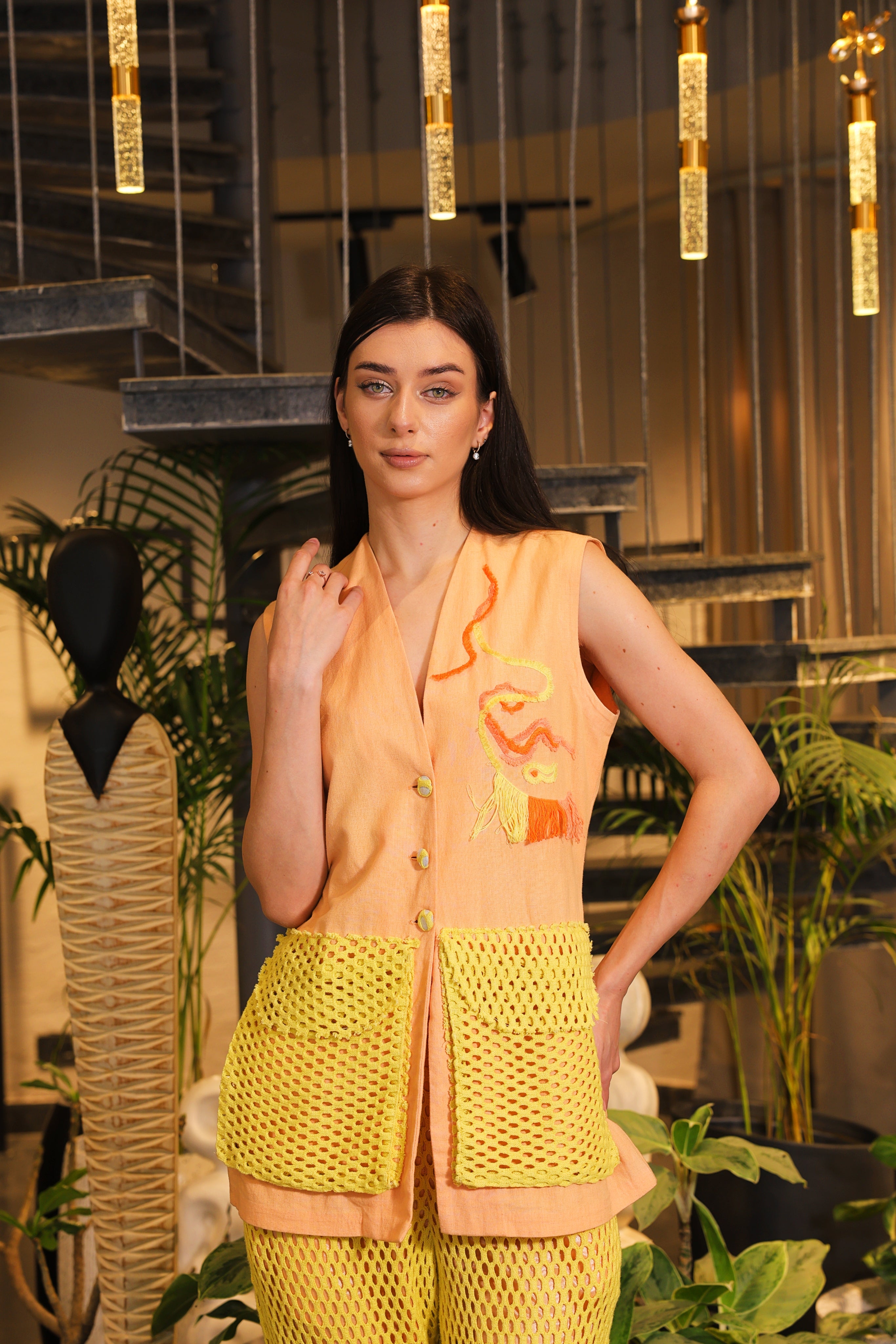 Shirt embellished with crochet pockets and crochet pants