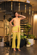 Shirt embellished with crochet pockets and crochet pants