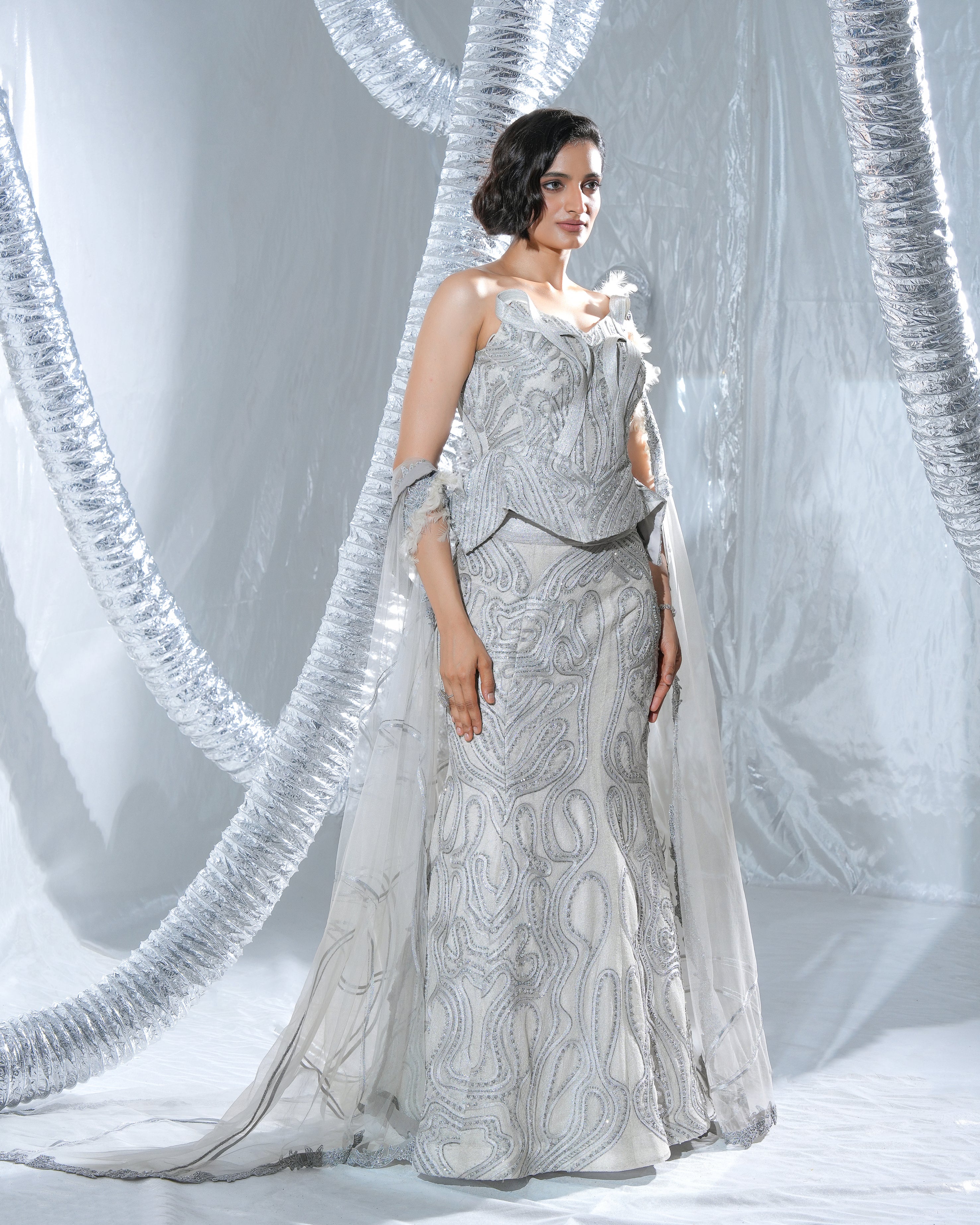 Peplum neo wave corset paired with a neo wave gown and veil neo