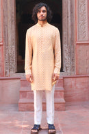 PALE PEACH PRINT KURTA ,WITH PANT PAJAMA AND WAISTCOAT