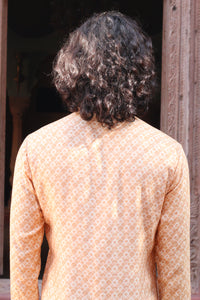 PALE PEACH PRINT KURTA ,WITH PANT PAJAMA AND WAISTCOAT