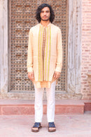 PALE PEACH PRINT KURTA ,WITH PANT PAJAMA AND WAISTCOAT