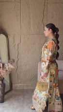 Long slit kurti , embellished with hand embroidery and tassels
