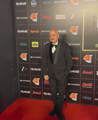 Anupam Kher in classic tuxedo