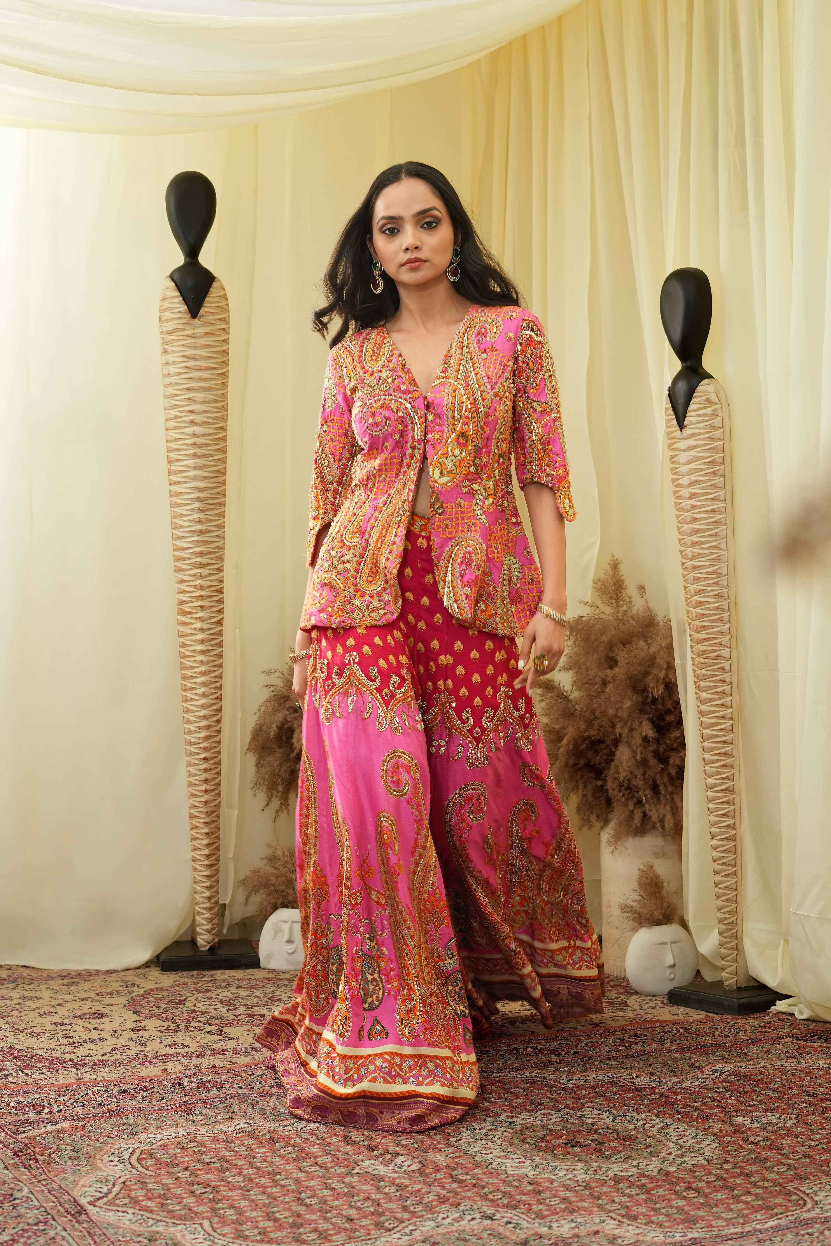 Pink print embroidered Jhankaar sharara pants with peplum cut bodice