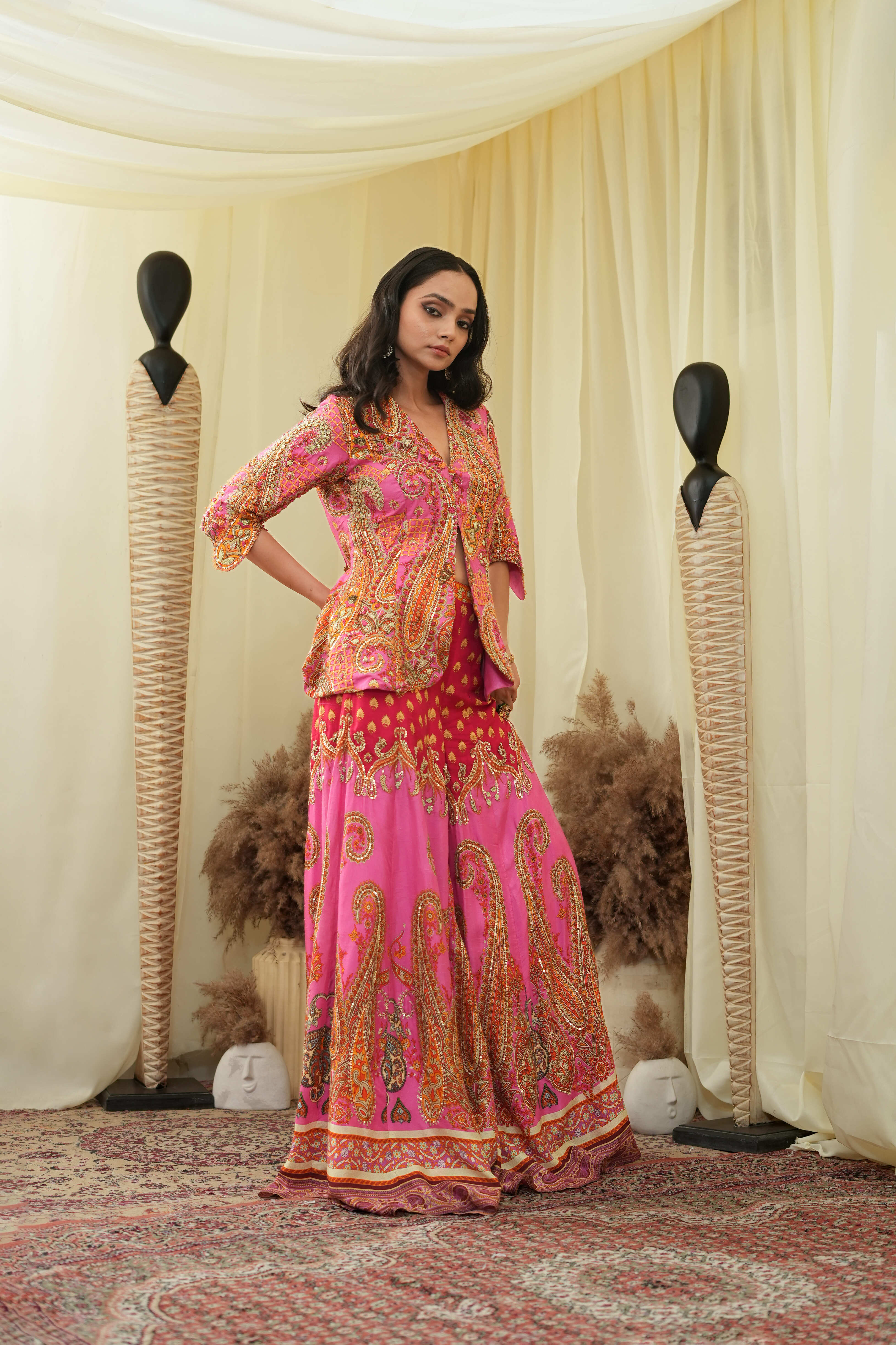 Pink print embroidered Jhankaar sharara pants with peplum cut bodice