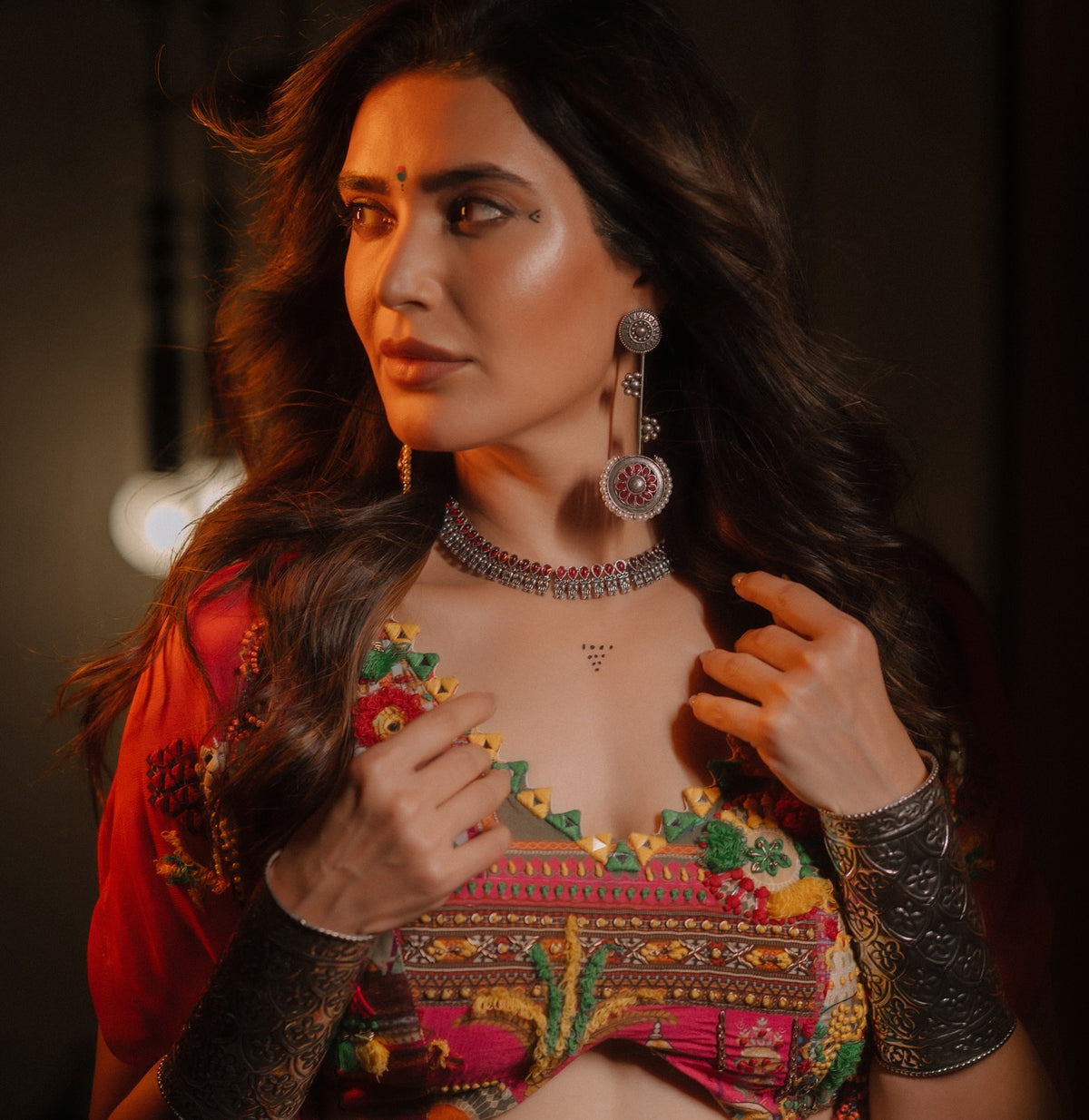 Karishma tanna in tangerine multi-coloured lehenga