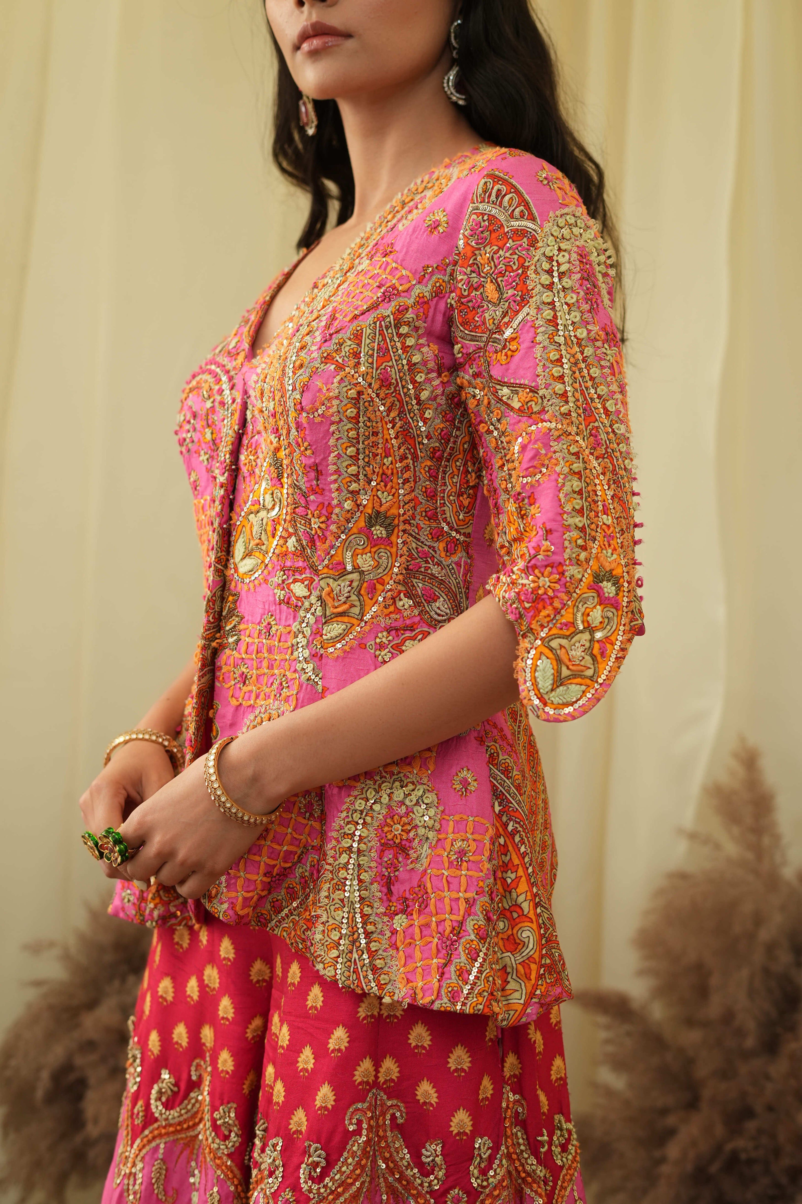 Pink print embroidered Jhankaar sharara pants with peplum cut bodice