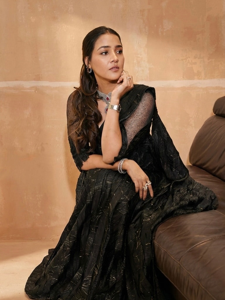 Priyanka raina Black corset saree, embellished with crushed and failed ethno strip with signature zardozdi embroidery neo