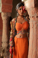 SIGNATURE PRINTS EMBROIDERED APRICOT BUSTIER AND DRAPE SKIRT WITH OVERLAY INDO WESTERN