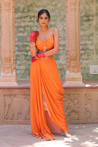 SIGNATURE PRINTS EMBROIDERED APRICOT BUSTIER AND DRAPE SKIRT WITH OVERLAY INDO WESTERN